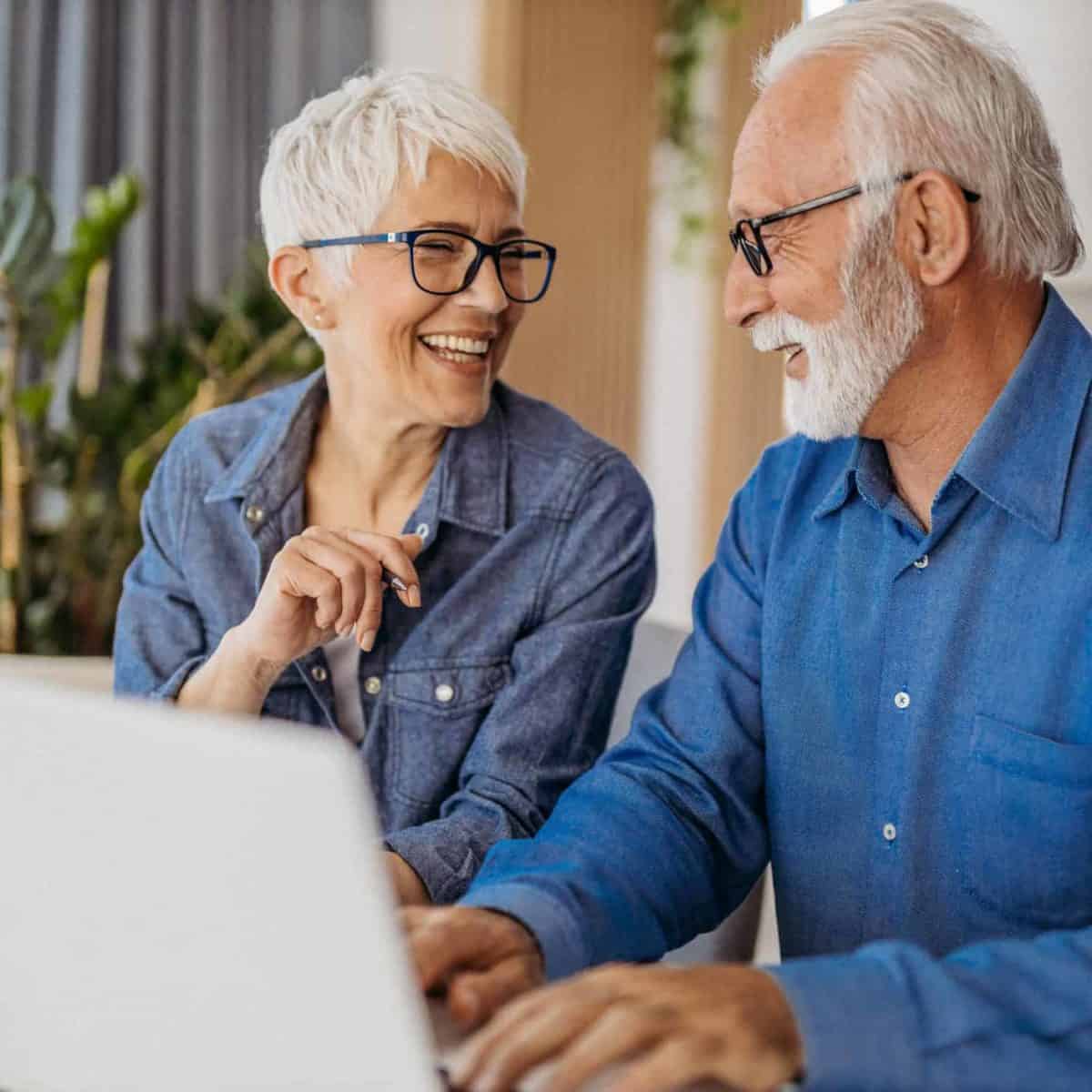 Missouri Precious Metals IRA & Investing Company Copy of Senior couple at laptop smiling GettyImages 1323096524 1200x1200 1